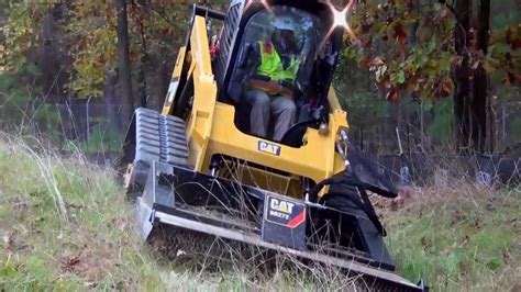 youtube skid steer working